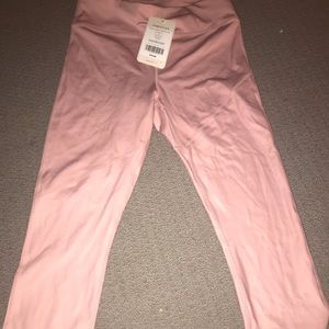 2 pairs of Fabletics pants size 6-8 medium
